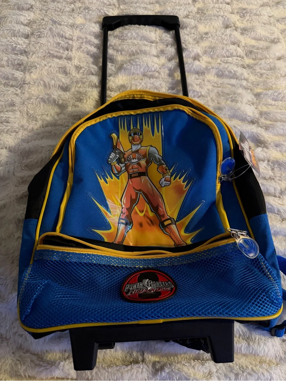 Power Ranger Blue and Yellow Rolling Backpack with power Ranger Graphic